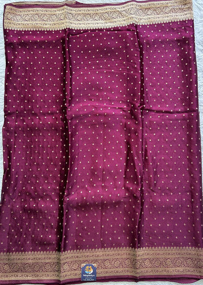 Satin Georgette Saree Magenta Colored Complemented with a Zari Border. - Sampradaya Designer Studio