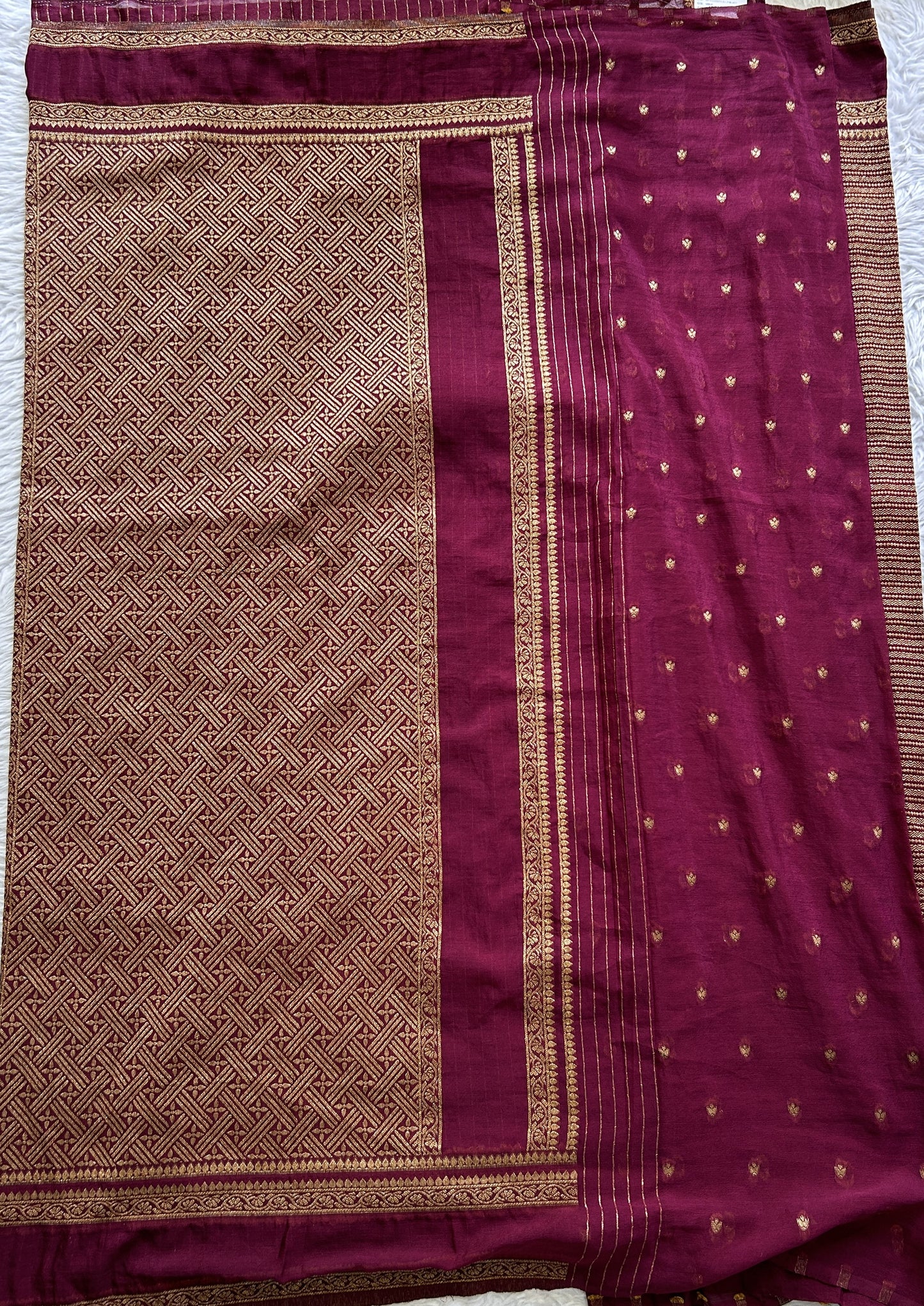 Semi Georgette Saree Plum Colored Complemented with a Zari Border. - Sampradaya Designer Studio