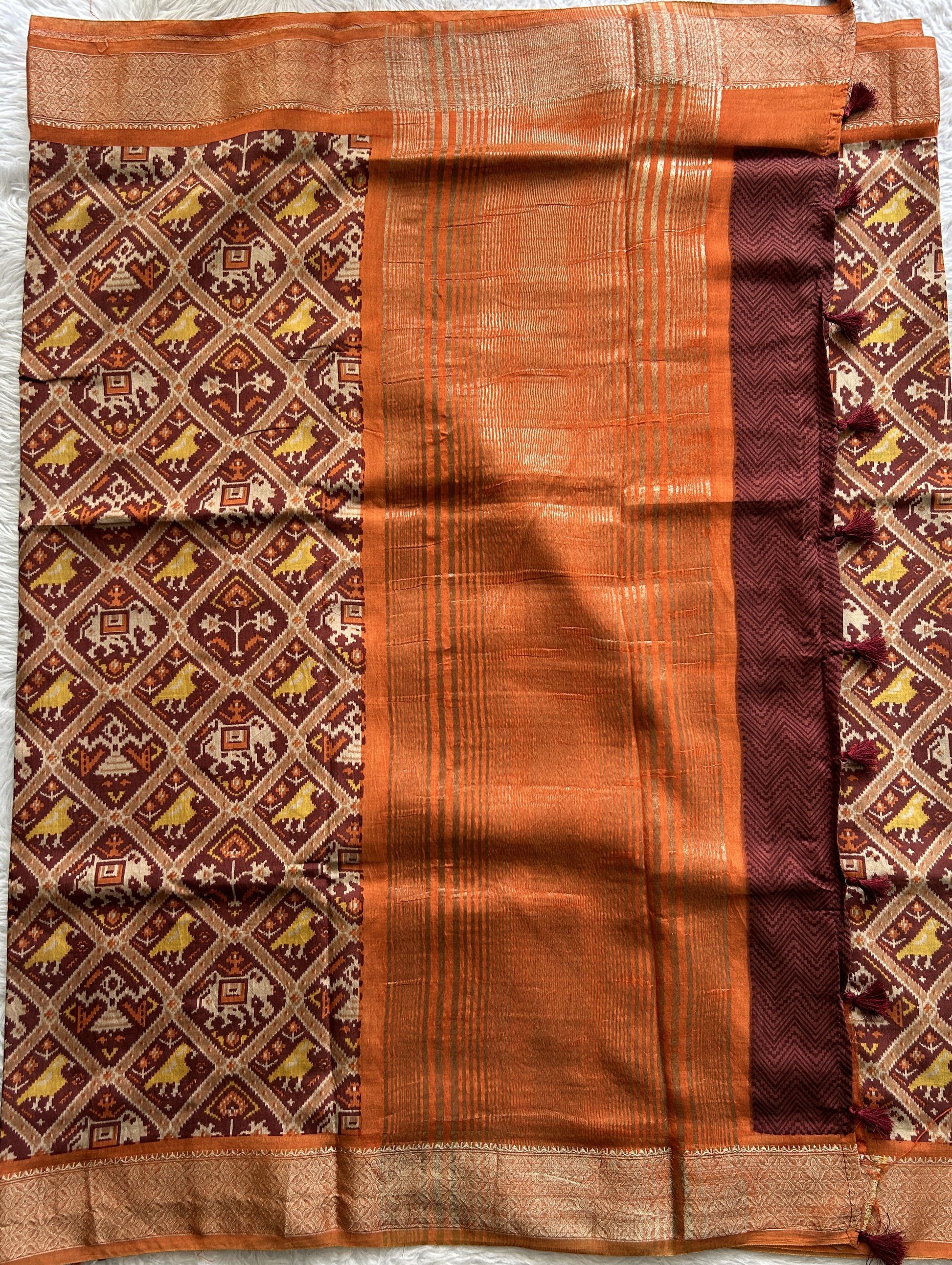 Dola Crepe Saree Brown Colored Complemented with a Zari Border. - Sampradaya Designer Studio