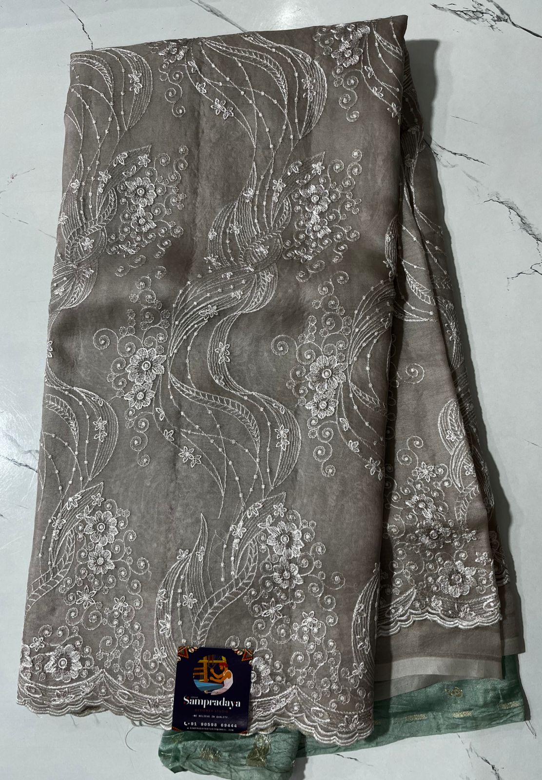 Banarasi Kora Silk Saree Cream Colored Complemented with a Scallop Border. - Sampradaya Designer Studio