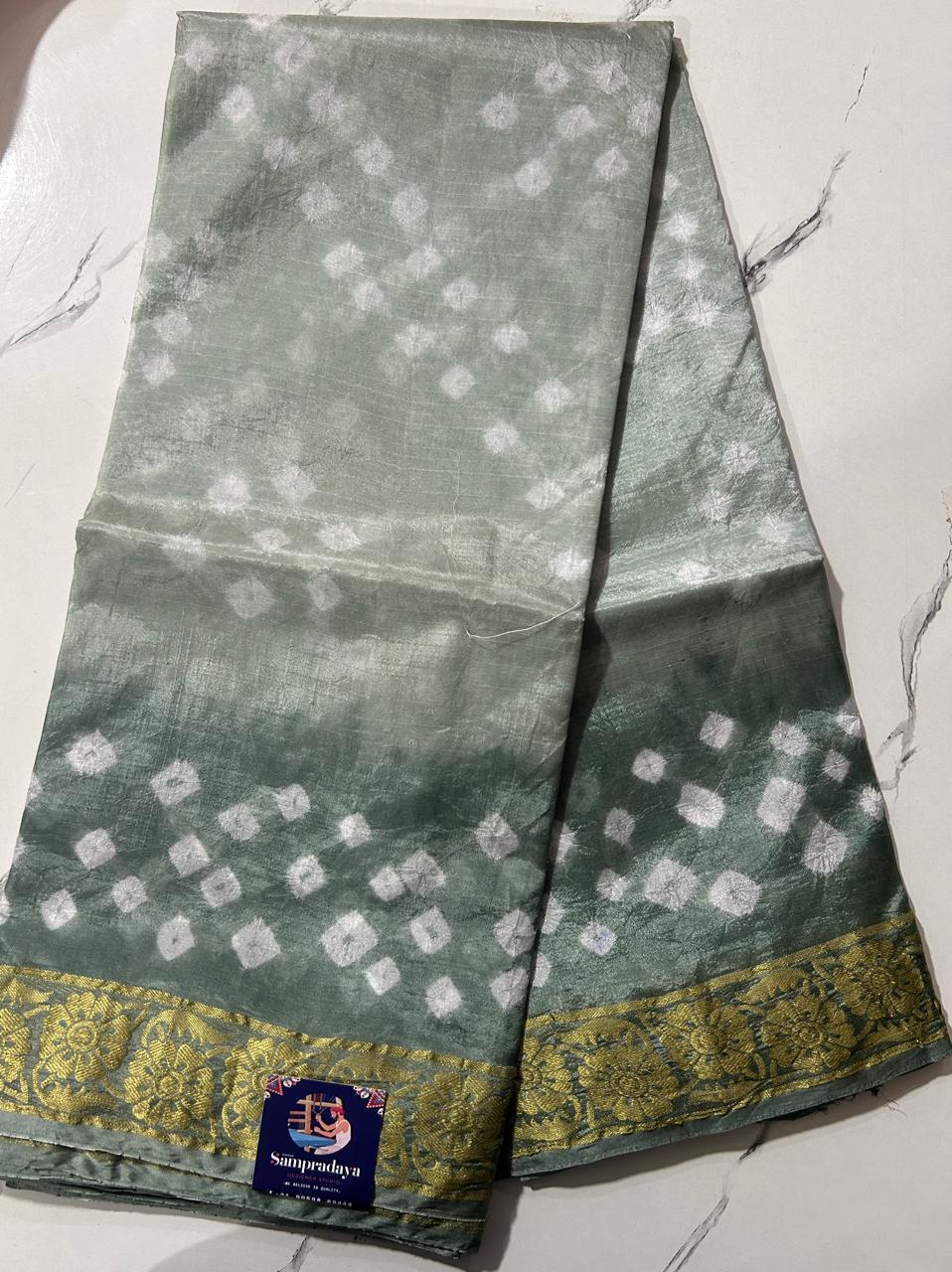 Bandhani Saree Sea Green Colored Complemented with a Zari Border. - Sampradaya Designer Studio