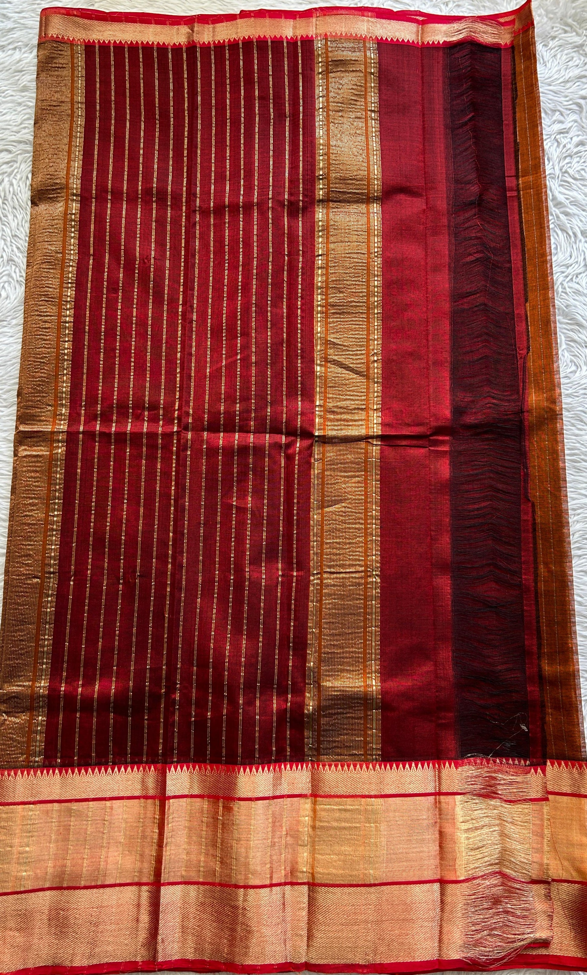 Mangalagiri Plain Pattu Saree Rust colored complemented with a Zari Border - Sampradaya Designer Studio