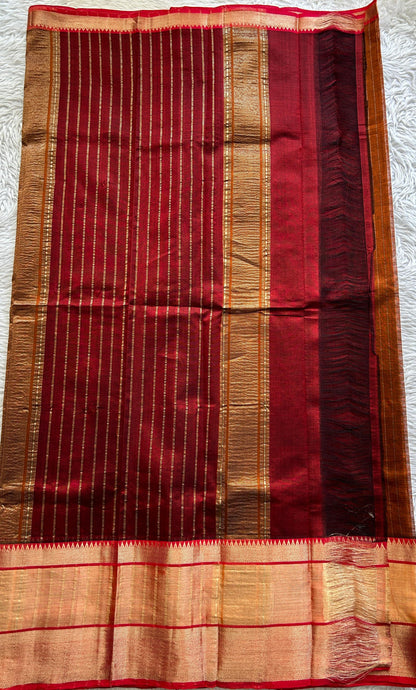 Mangalagiri Plain Pattu Saree Rust colored complemented with a Zari Border - Sampradaya Designer Studio